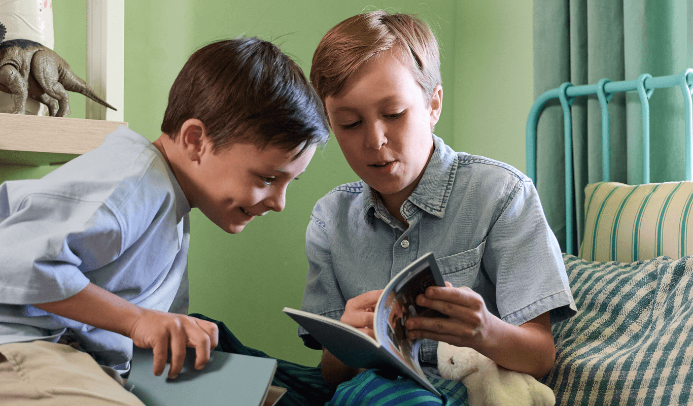 Mom and child looking at a Monthbook together