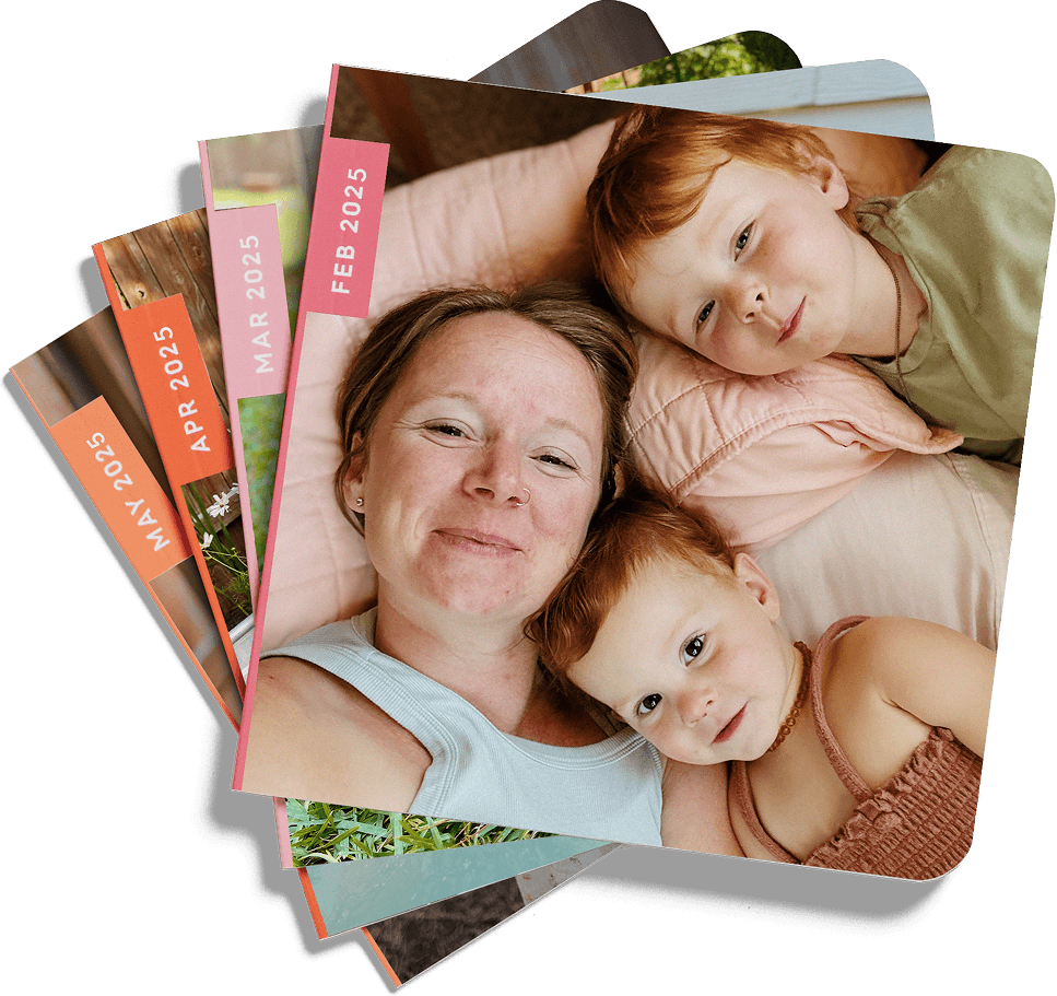 Stack of softcover Monthly Minis photo books