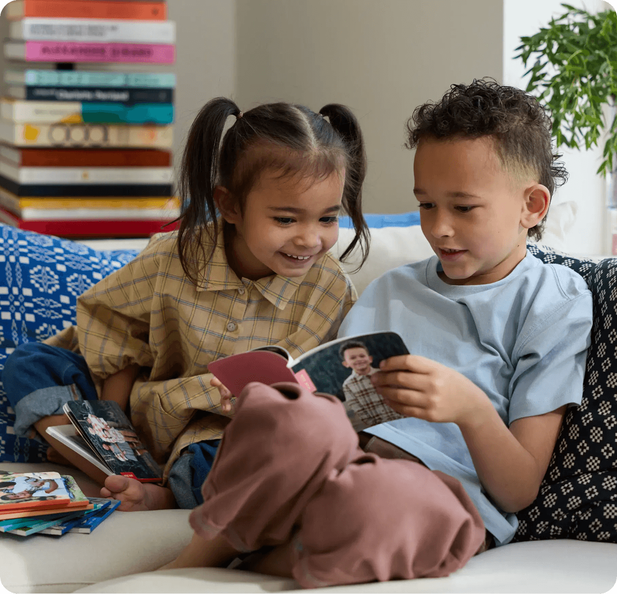 Toddlers reading a Monthly Mini photo book