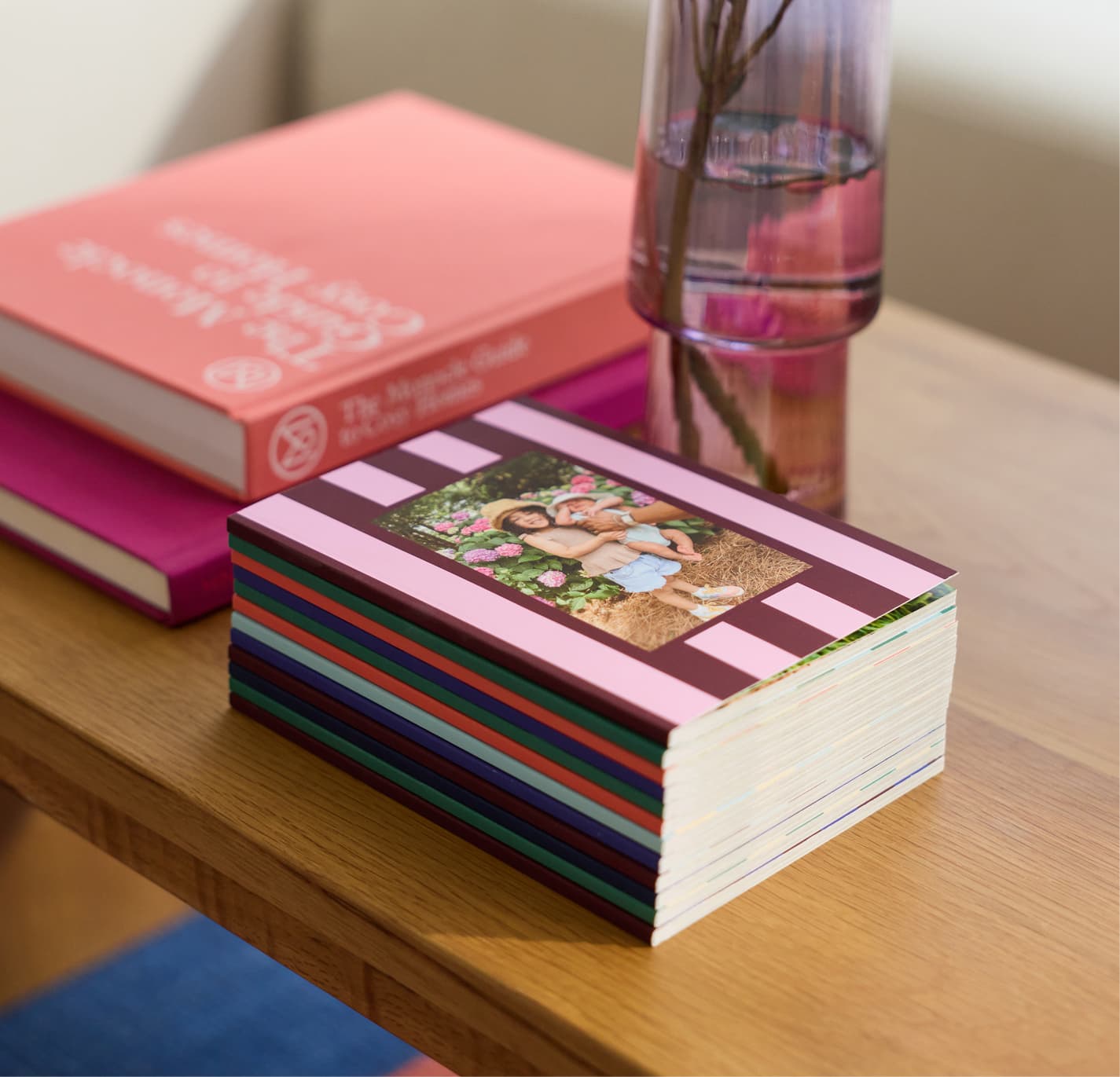 Stack of Chatbooks photo books on a table